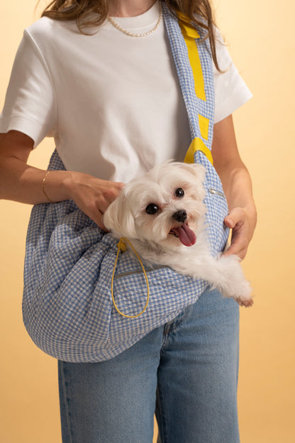 Breathable cotton fabric pet sling carrier for added comfort.