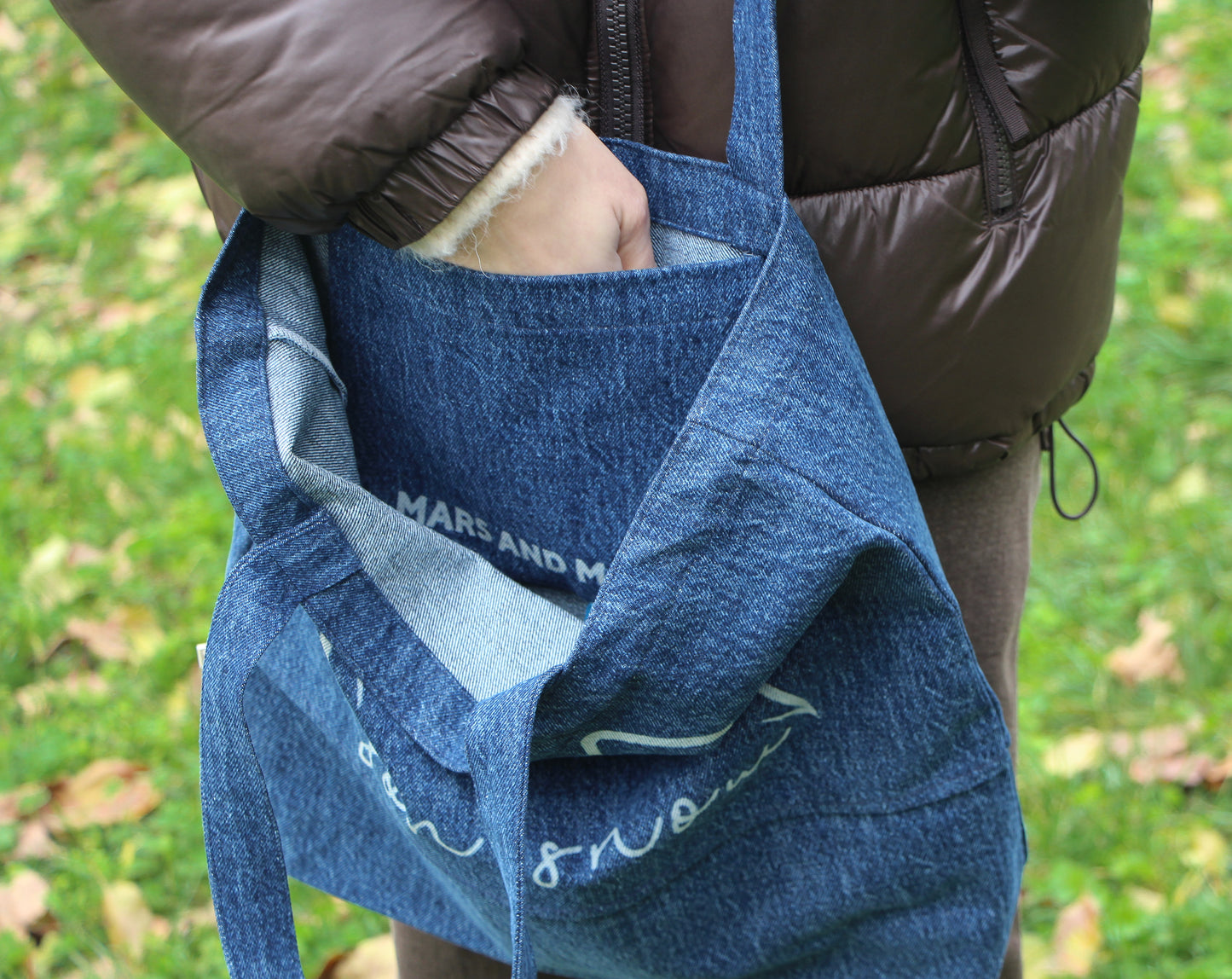 Close-up of the eco-friendly denim fabric used in the Custom Pet Tote Bag, emphasizing its durability and style.