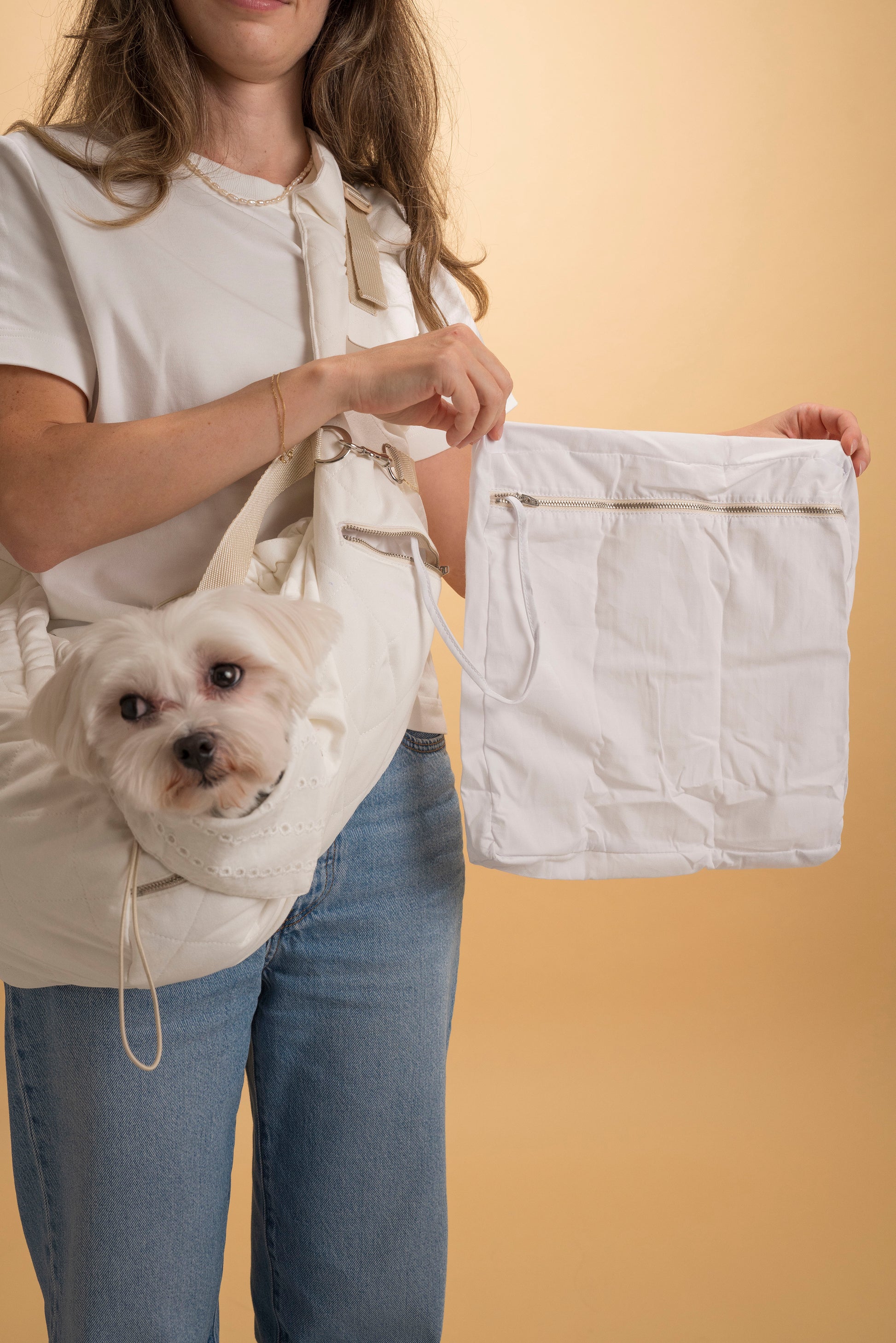 Travel-friendly pet sling that folds into a small pouch for easy storage and on-the-go use.