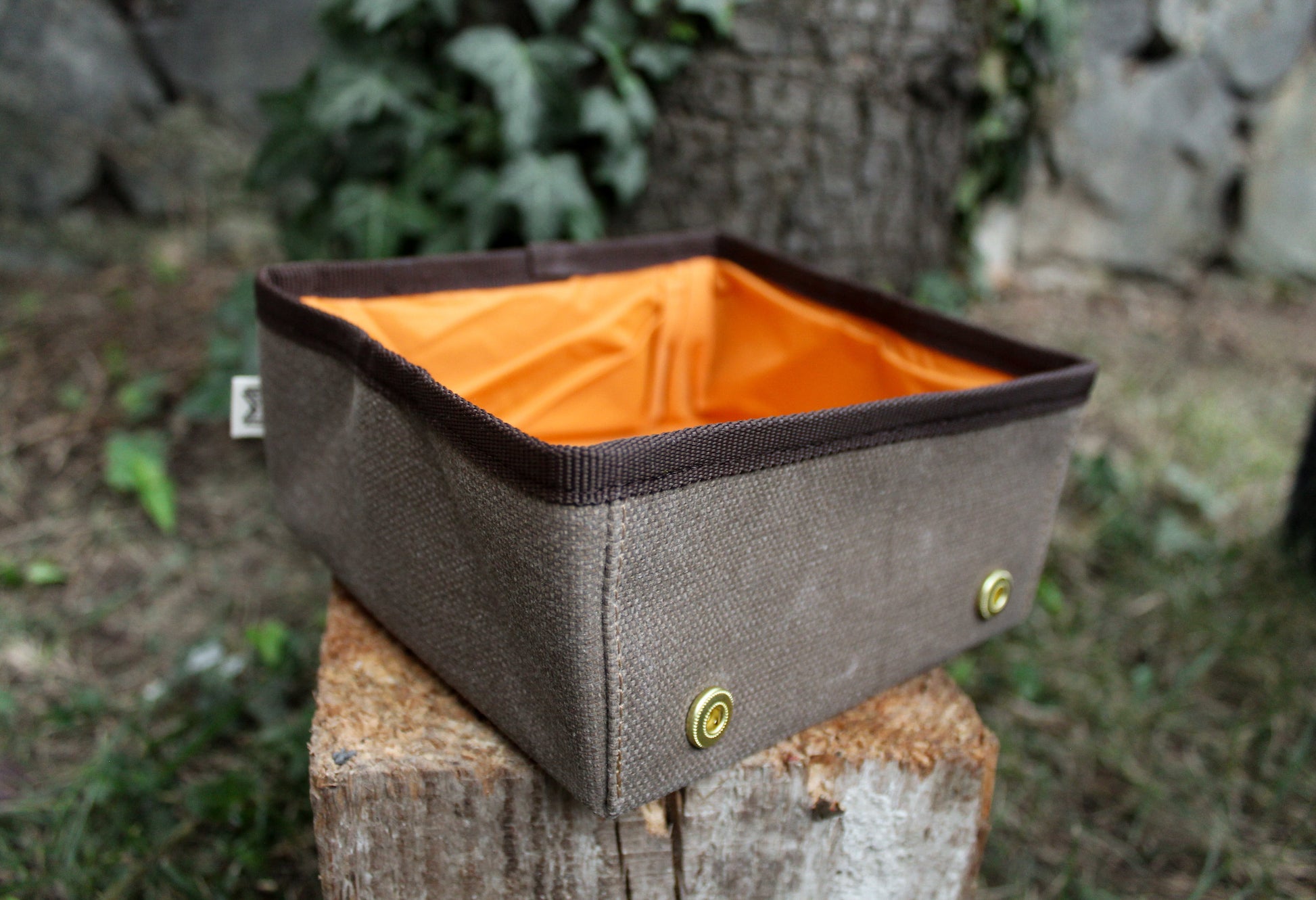 Durable square travel dog bowl made for long-lasting use.