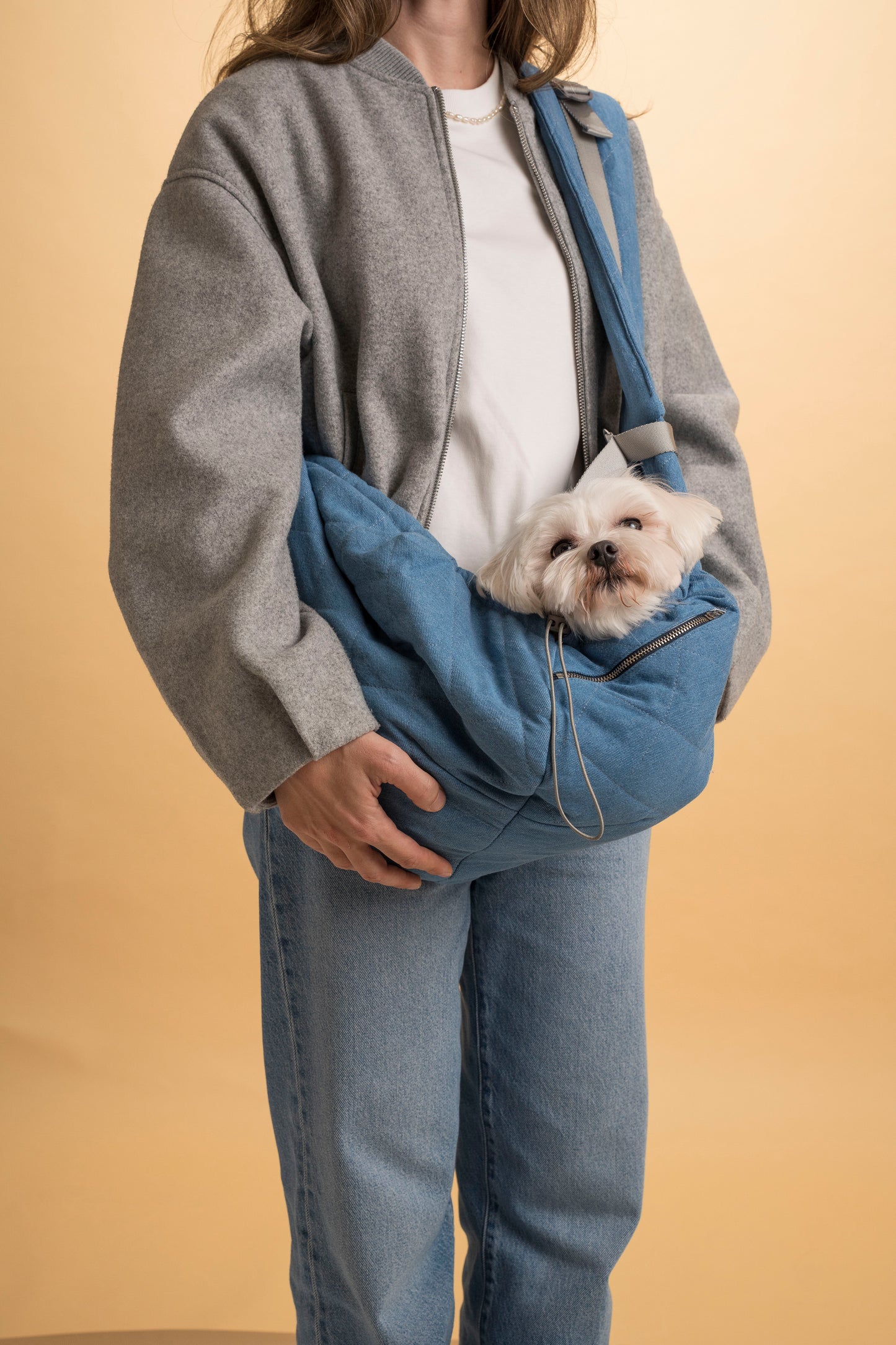 Eco-friendly denim pet sling carrier for dogs and cats under 10 lbs.