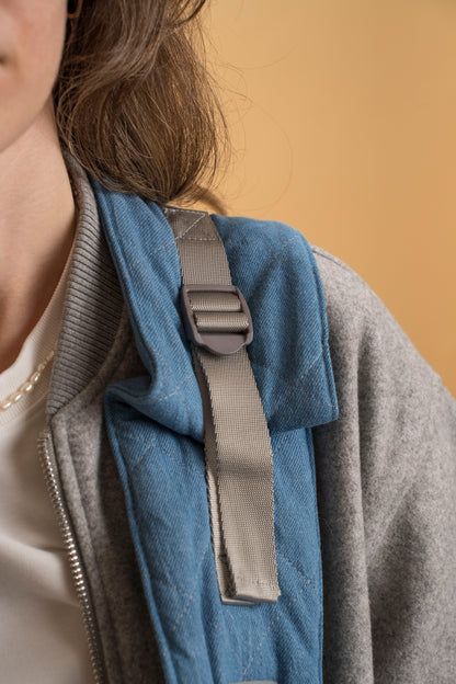 Close-up of the adjustable strap system on the Mars and Mocha Dog Sling Carrier, allowing for a customizable and secure fit.