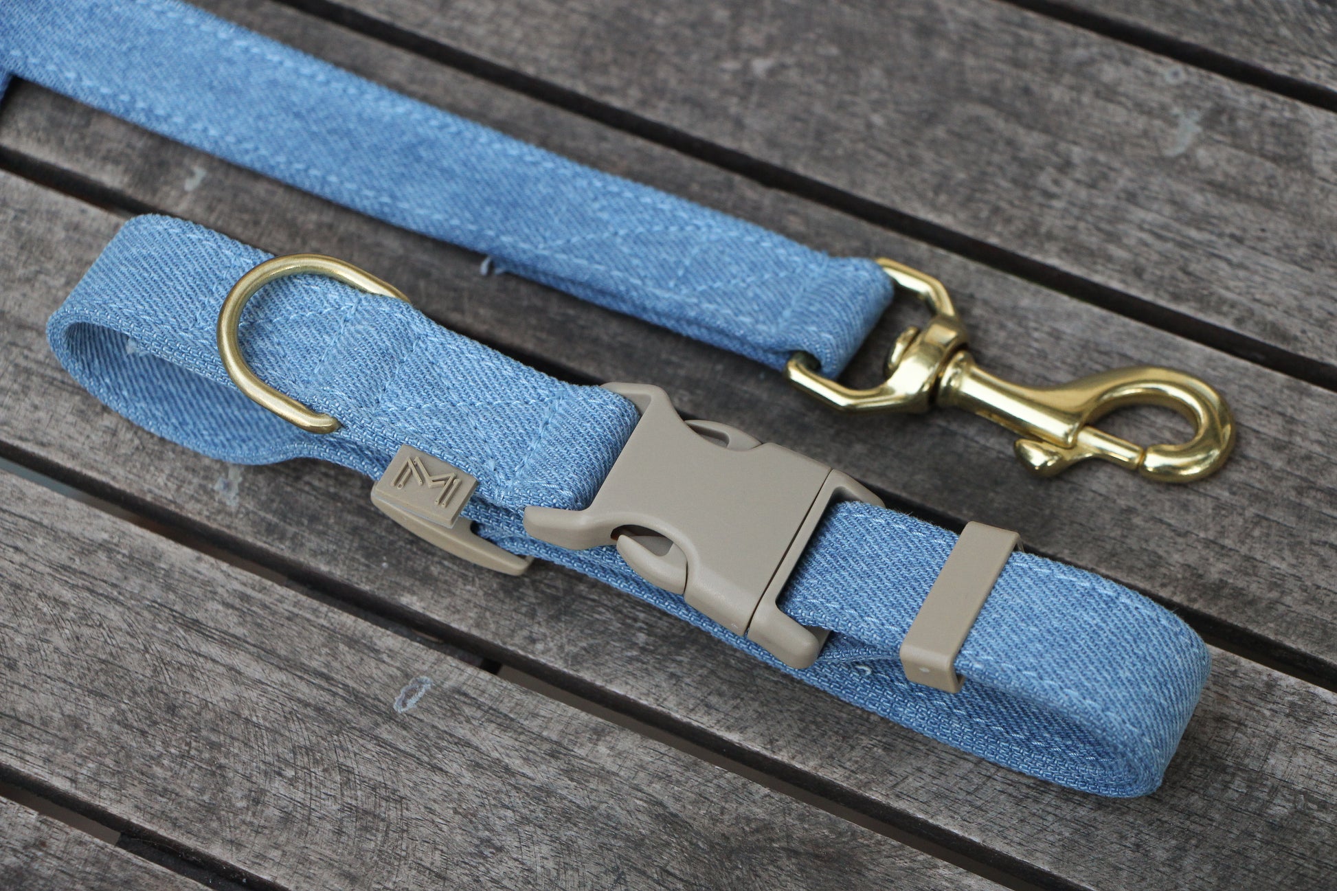 Close-up of the Light Denim Dog Collar and Matching Leash, highlighting the brass D-ring and detailed stitching.