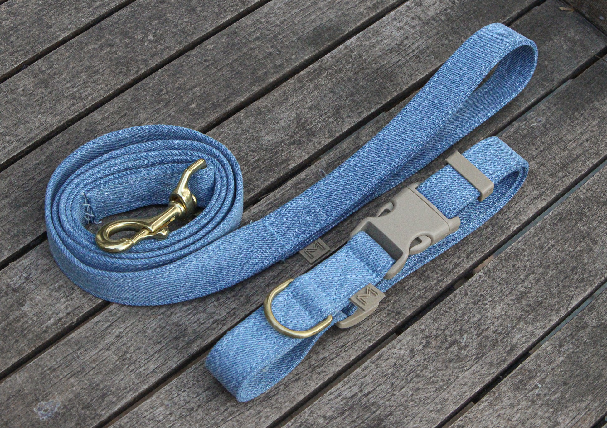 Close-up of the Light Denim Dog Collar and Matching Leash, highlighting the brass D-ring and detailed stitching.