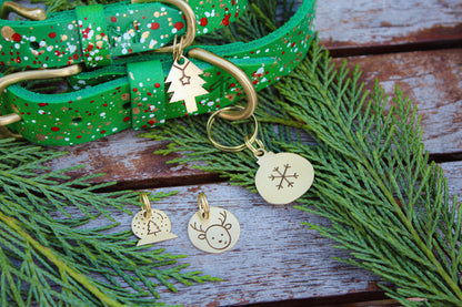 Matching holiday dog collar and ID tag set crafted for seasonal style.