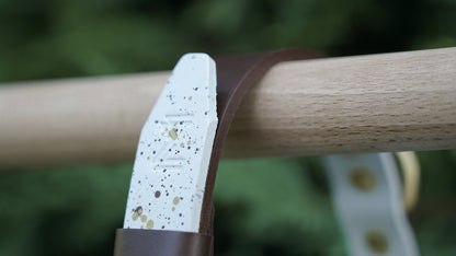 Close-up of leather texture on the multi-color pet collar.