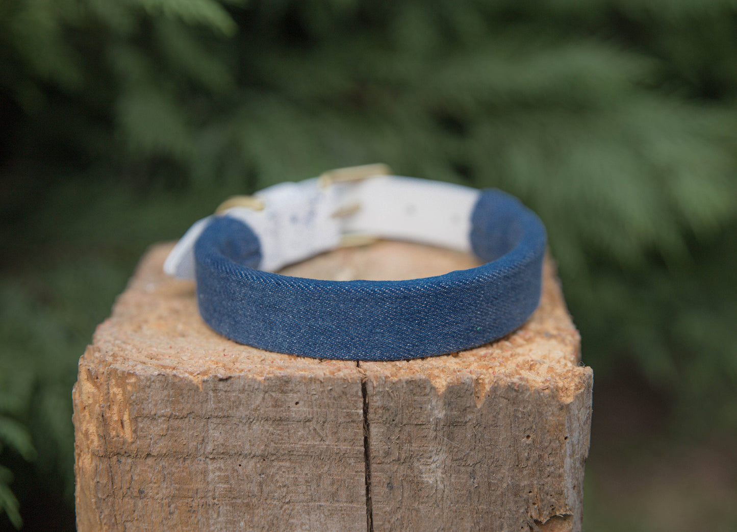 Denim sleeve designed for pet collars, offering a custom fit.