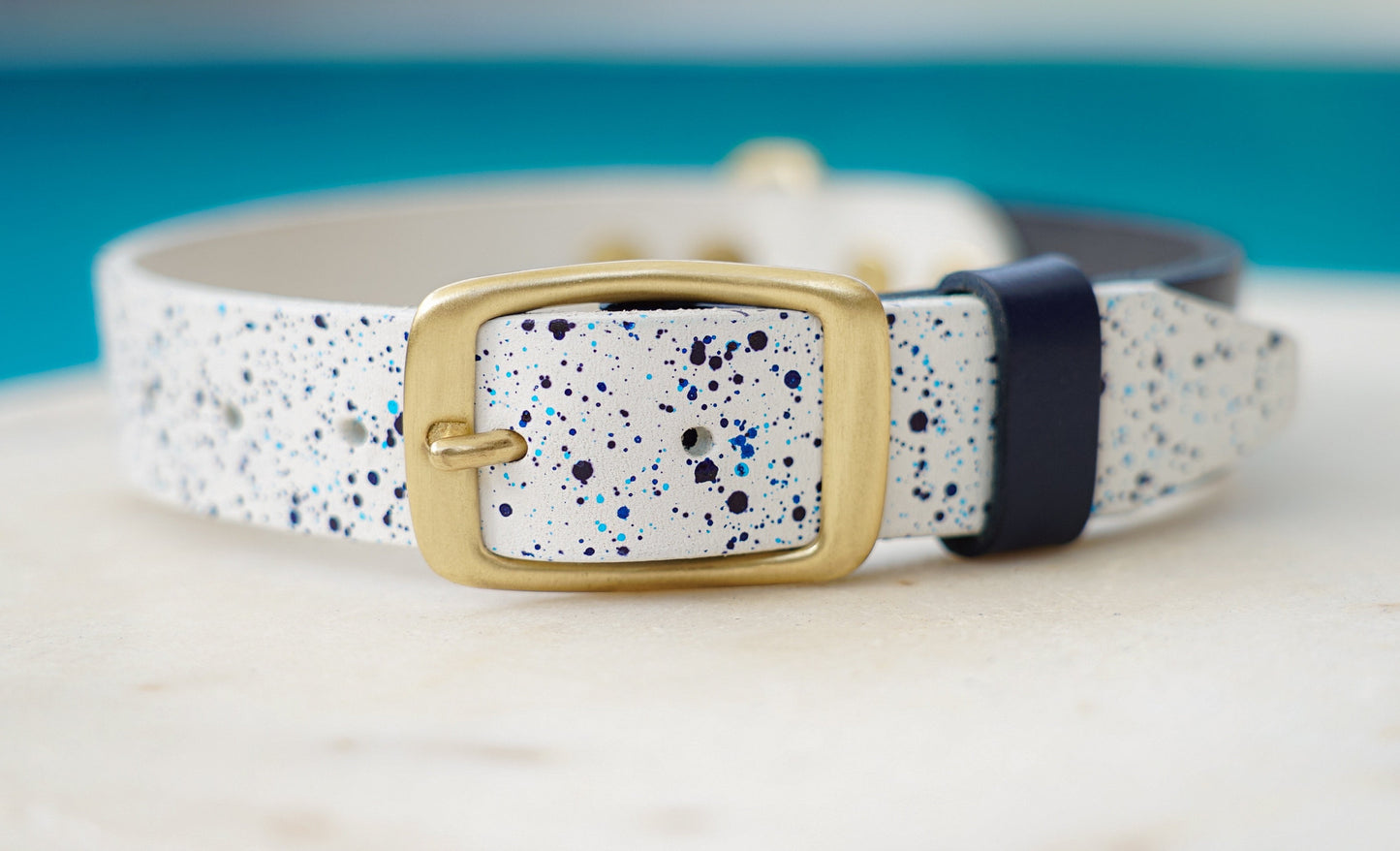 White and navy leather dog collar designed for comfort and style.